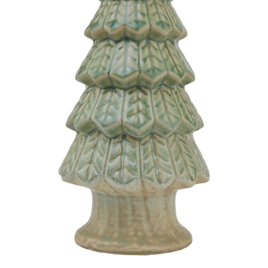 Handcrafted matte green ceramic Christmas tree sculpture with minimalist design and stable base. by Sostter at brixbailey.com