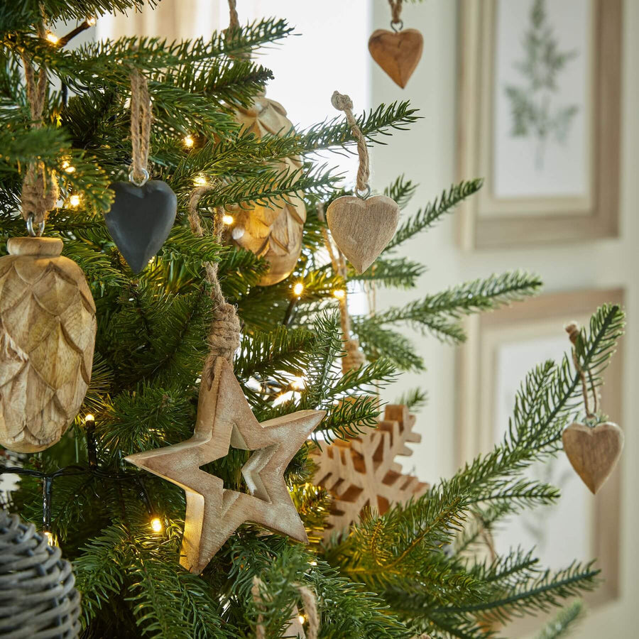 Handcrafted wooden heart ornament with distressed brown finish and visible wood grain, rustic home decor accent by Sostter at brixbailey.com