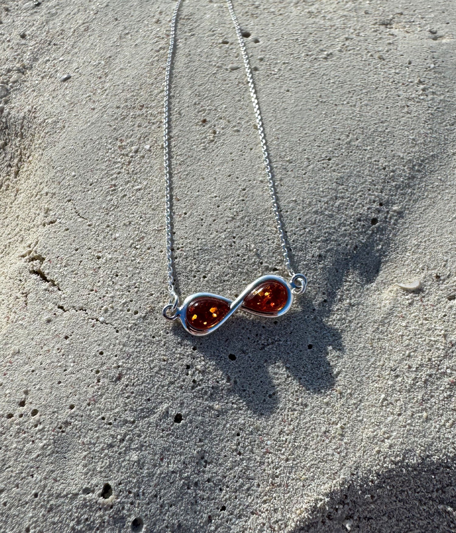 Infinity Amber Necklace in Sterling Silver