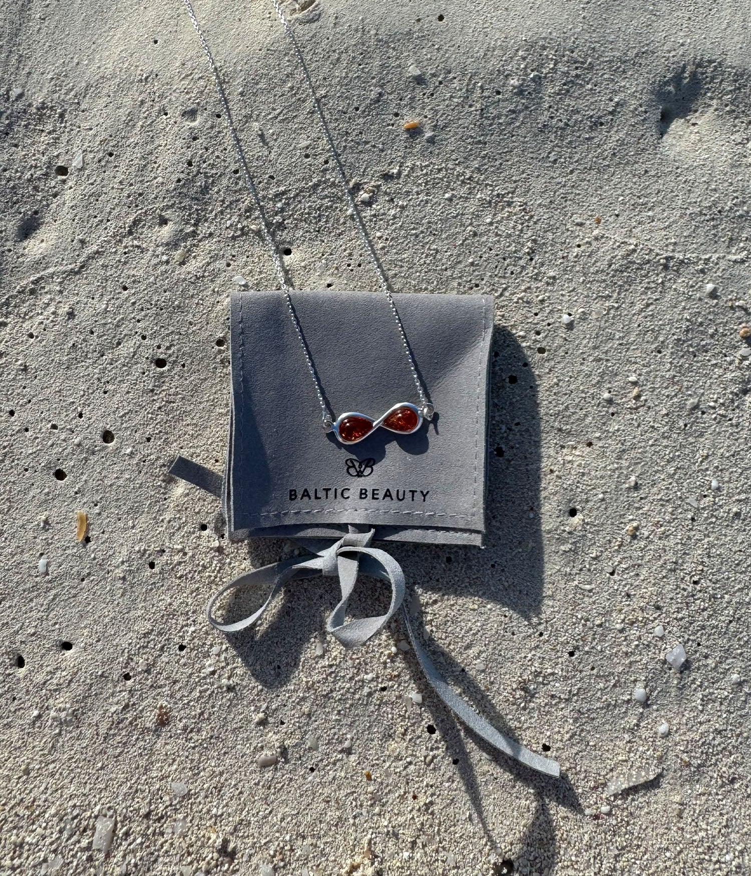 Infinity Amber Necklace in Sterling Silver