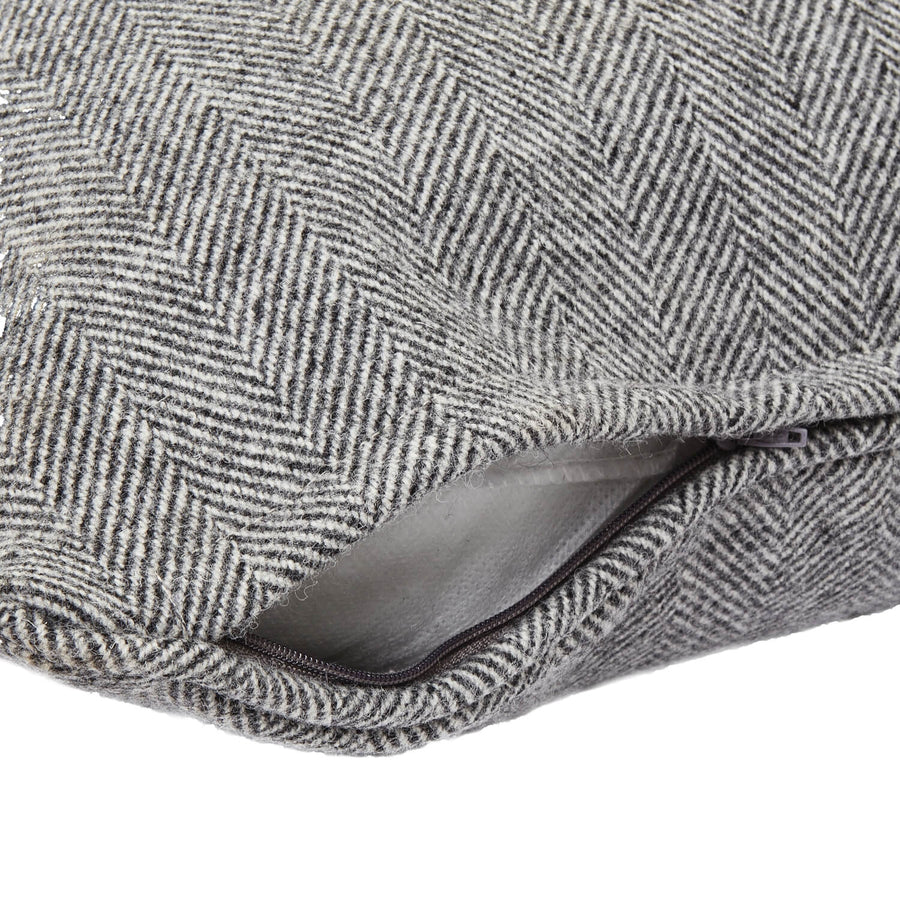Neutral grey herringbone wool cushion with piped edges for elegant home decor by Sostter at brixbailey.com