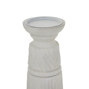 Hand-carved white wood candle holder with geometric patterns, 20cm tall, diffusing soft ambient light. by RoomLondon at brixbailey.com