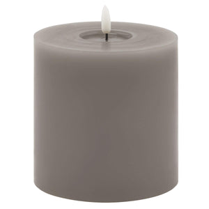 Grey melt-effect LED wax candle with realistic dripping texture and warm flameless glow for ambient lighting by sostter at brixbailey.com