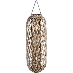 Handwoven wicker lantern with intricate rattan weave, creating warm light patterns, rustic brown home decor. by sostter at brixbailey.com