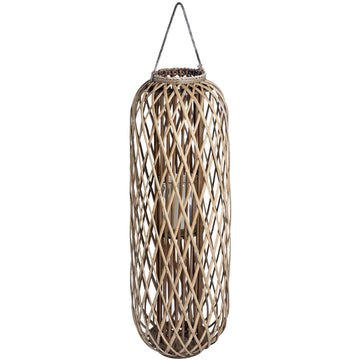 Handwoven wicker lantern with intricate rattan weave, creating warm light patterns, rustic brown home decor. by Sostter at brixbailey.com