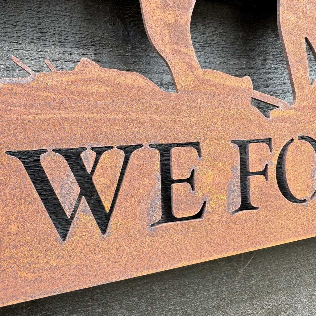 A Rusty Metal Lest We Forget Soldier Scene Garden Decoration