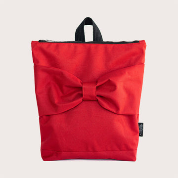 Red Bow Backpack for Kids – Waterproof & Playful Design by Muni at www.brixbailey.com