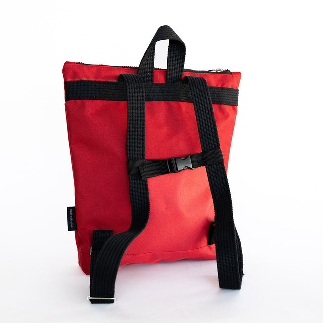 Red Bow Backpack for Kids – Waterproof & Playful Design by Muni at www.brixbailey.com