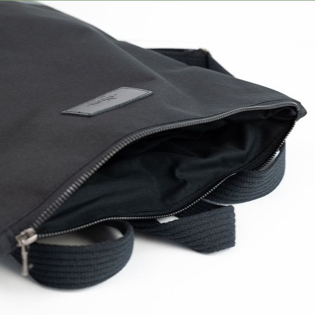 Black & Green Leather Backpack – Stylish & Weather-Resistant by Muni at www.brixbailey.com