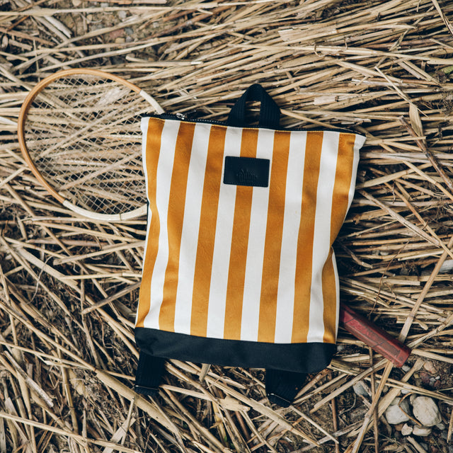 Striped Mustard Kids' Backpack – Stylish & Durable for Adventures by Muni at brixbailey.com