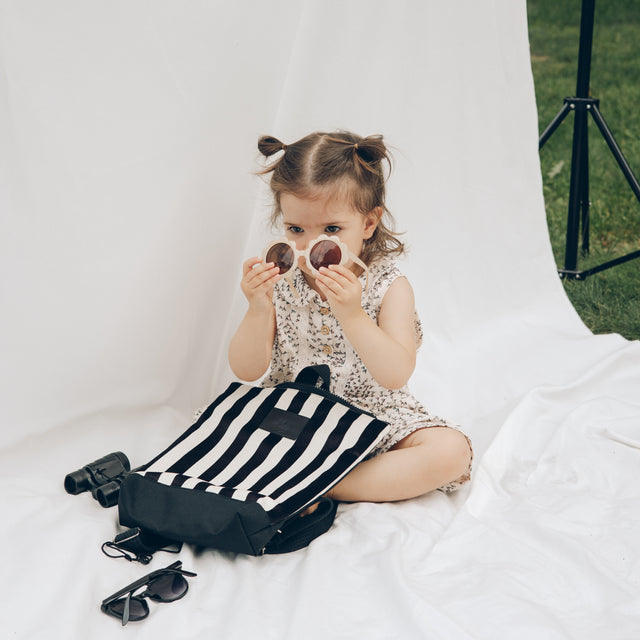 Striped Backpack: Stylish & Durable with Black and White Design by Muni at www.brixbailey.com
