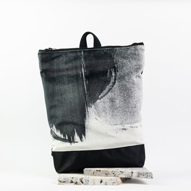 Black Watercolor Backpack - Stylish & Waterproof for Everyday Use by Muni at www.brixbailey.com