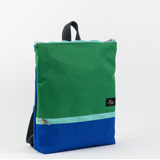 Green+Blue Waterproof Backpack – Stylish & Durable for Adventures by Muni at brixbailey.com