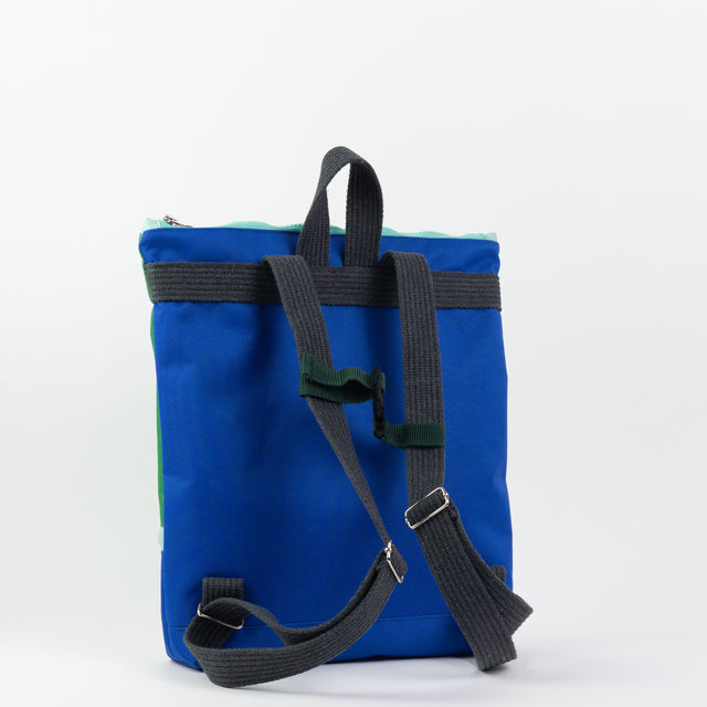 Green+Blue Waterproof Backpack – Stylish & Durable for Adventures by Muni at brixbailey.com