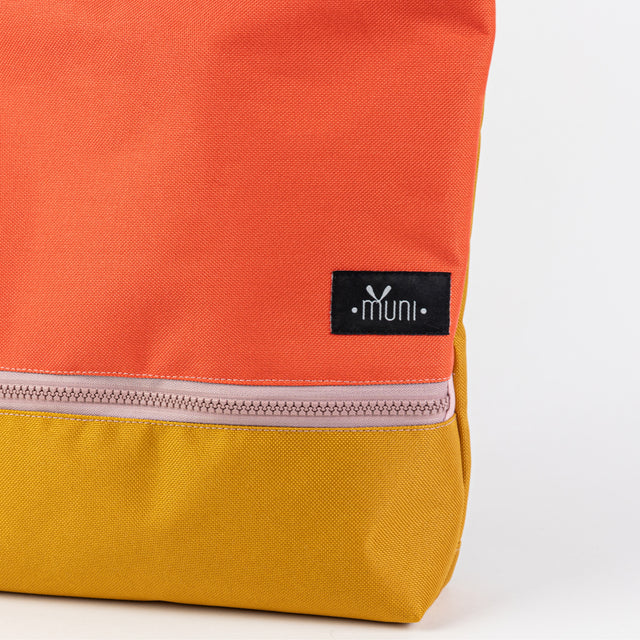 Orange+Yellow Adventurer's Backpack – Waterproof & Comfortable by Muni at brixbailey.com