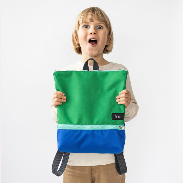 Waterproof Green+Blue Backpack – Perfect for Outdoor Adventures by Muni at www.brixbailey.com