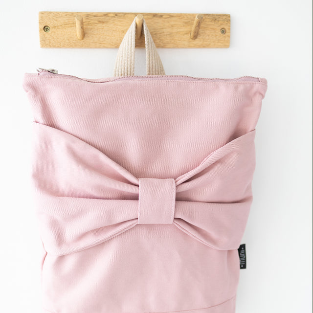 Pink Denim Backpack with Bow – Stylish & Practical for Everyday by Muni at www.brixbailey.com