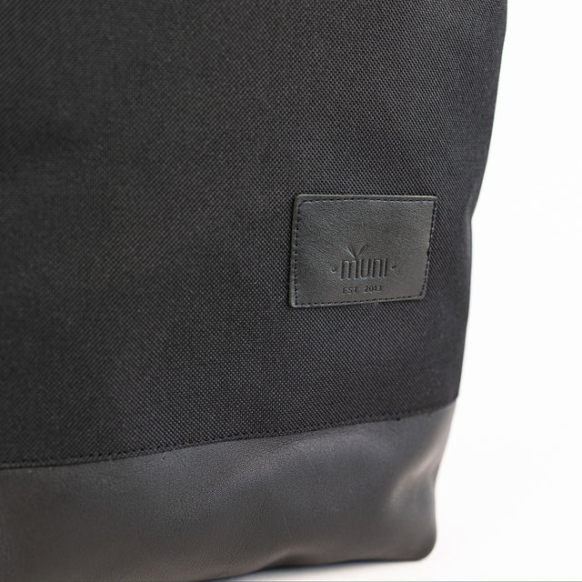 Waterproof Black Leather Backpack – Stylish & Functional by Muni at brixbailey.com