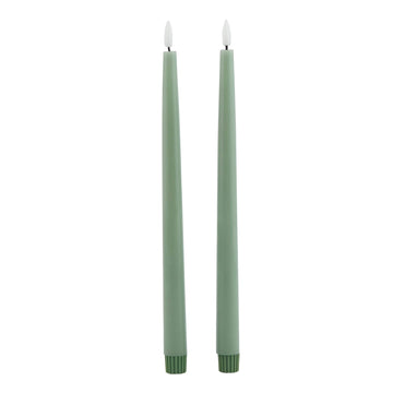 Sage green LED candle with realistic wax texture and flickering glow, 25 cm tall, flame-free ambiance for home decor. by Hill Interiors at brixbailey.com