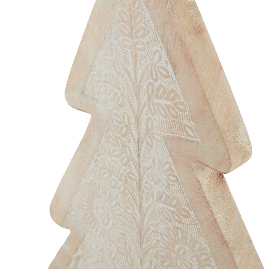 Handcrafted white-washed wooden decorative tree with intricate carvings, perfect for modern farmhouse or Scandinavian interiors. by Sostter at brixbailey.com