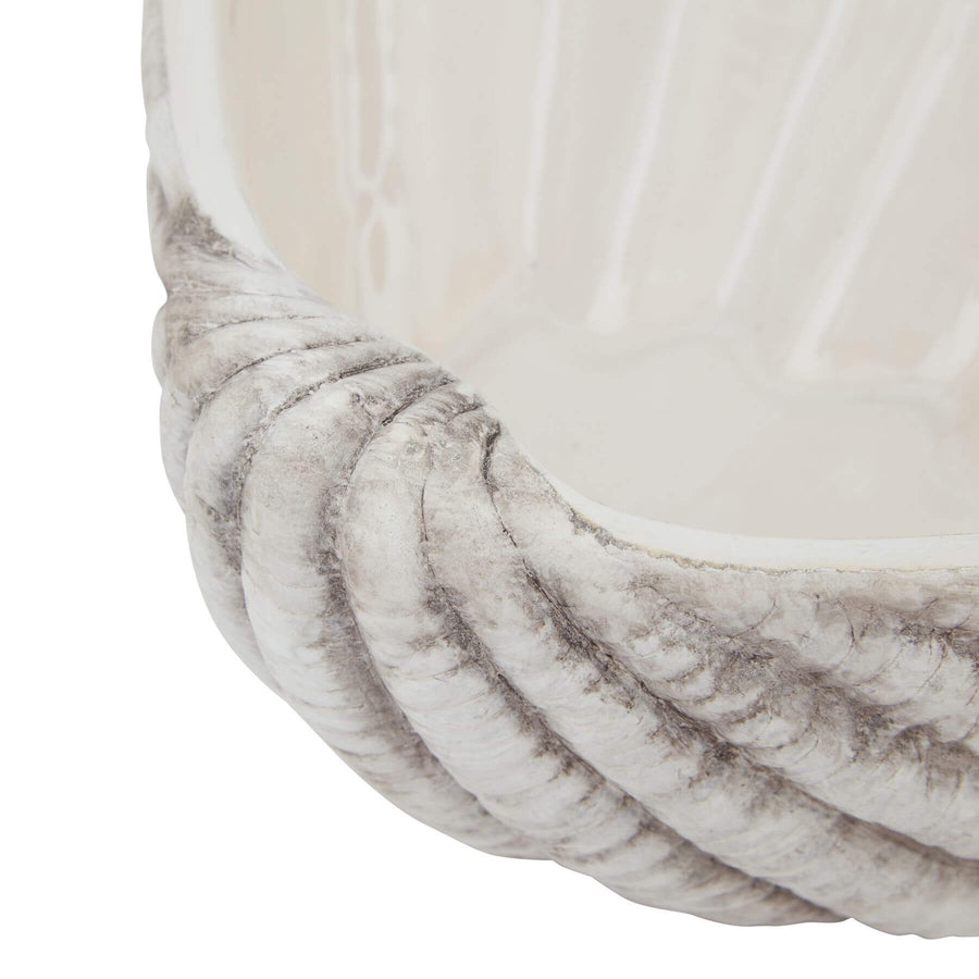 Handcrafted white ceramic shell bowl with organic spiral design and matte finish for coastal-inspired home decor. by Sostter at brixbailey.com