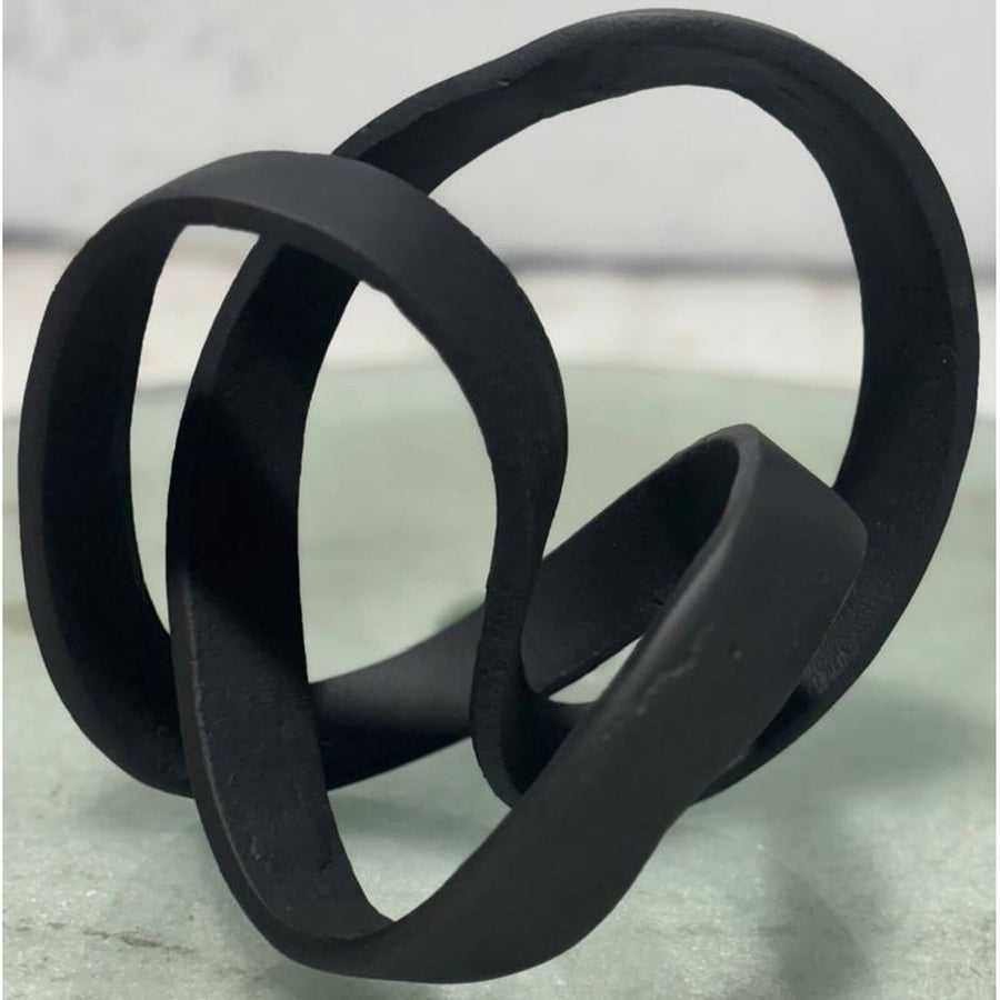Black aluminum sculptural knot ornament with seamless curves, contemporary dÃ©cor accent piece, 16cm height. by Sostter at brixbailey.com