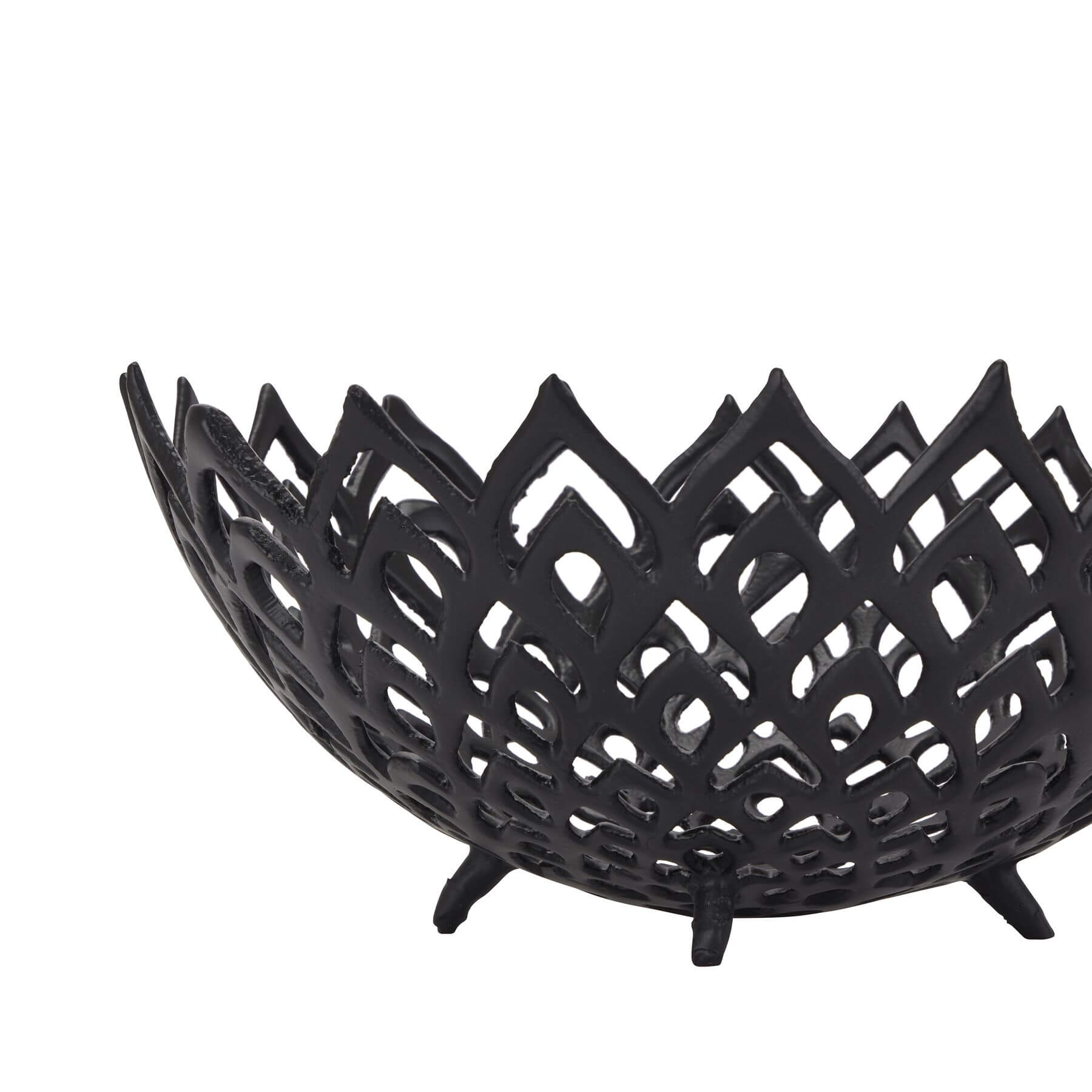 Black perforated steel lattice bowl casting intricate light patterns, modern matte home decor centerpiece by Sostter at brixbailey.com