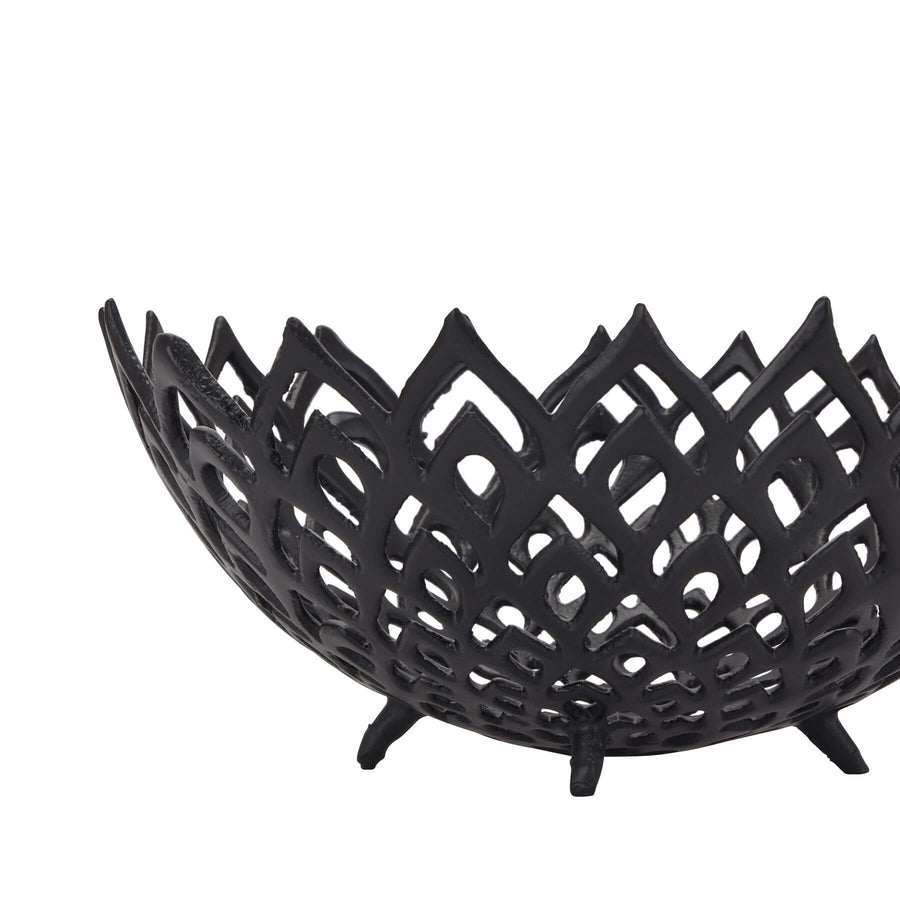 Black perforated steel lattice bowl casting intricate light patterns, modern matte home decor centerpiece by Sostter at brixbailey.com