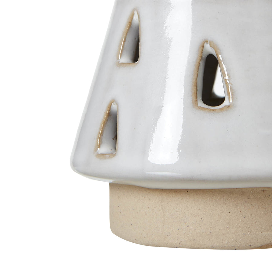 Handcrafted white ceramic LED tree with delicate cut-out patterns, creating warm ambient lighting for modern decor. by Sostter at brixbailey.com