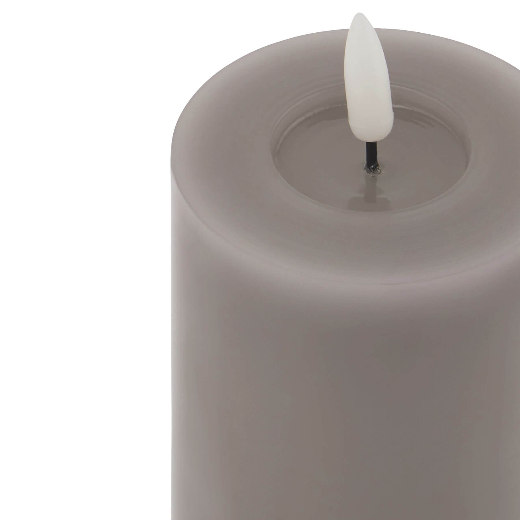 Grey LED wax candle with realistic flicker effect, battery-operated for safe ambient lighting by Sostter at brixbailey.com