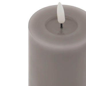 Grey LED wax candle with realistic flicker effect, battery-operated for safe ambient lighting by sostter at brixbailey.com
