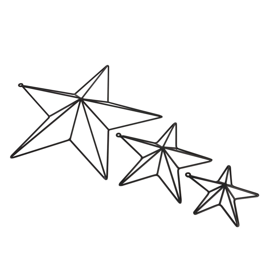 Matte black convex metal star wall art, modern contemporary decor with industrial style, 35cm wide, creates dimensional depth by Sostter at brixbailey.com