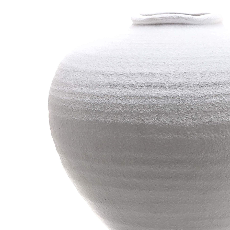 Matte white ceramic vase with clean lines, 35cm sculptural silhouette for floral arrangements, minimalist home decor by Sostter at brixbailey.com