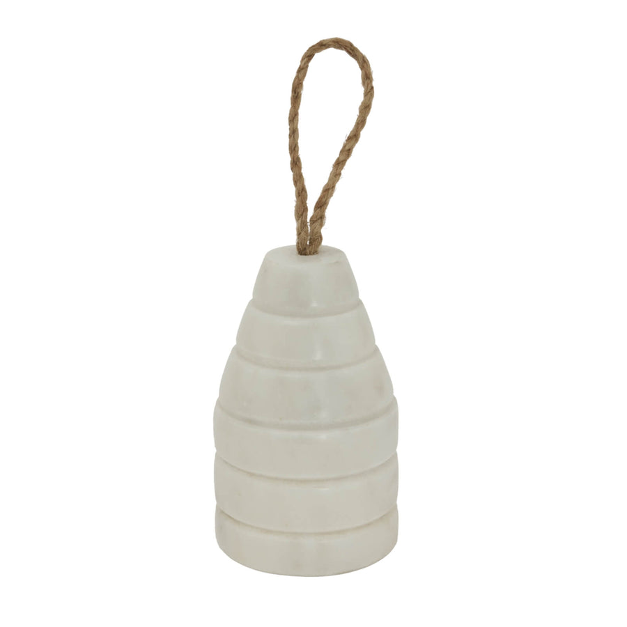 White marble ribbed doorstop with natural veining, hand-finished texture, and weighted design for home decor (124 chars) by Sostter at brixbailey.com