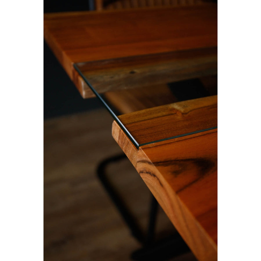 Live edge square dining table with glass river center, rich brown wood, and black metal baseâ€”modern rustic fusion. by Sostter at brixbailey.com