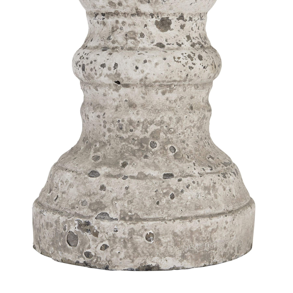 Stone ceramic column candle holder with weathered texture, natural tone, and monolithic silhouette for modern decor. by Sostter at brixbailey.com
