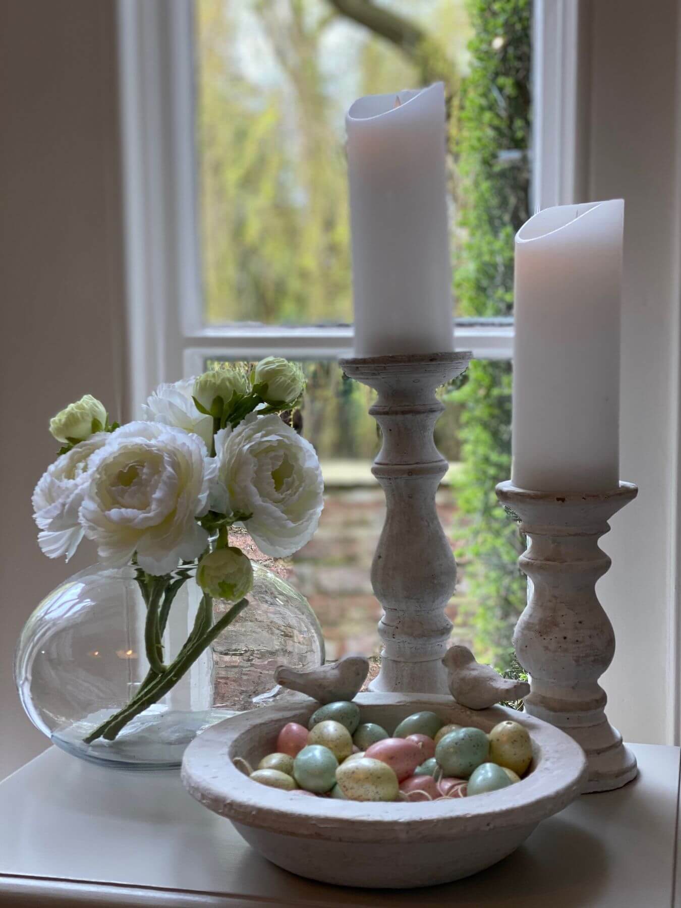 Handcrafted stone-effect bird bath with weathered patina, warm cream finish, and natural textures for garden elegance. by Sostter at brixbailey.com