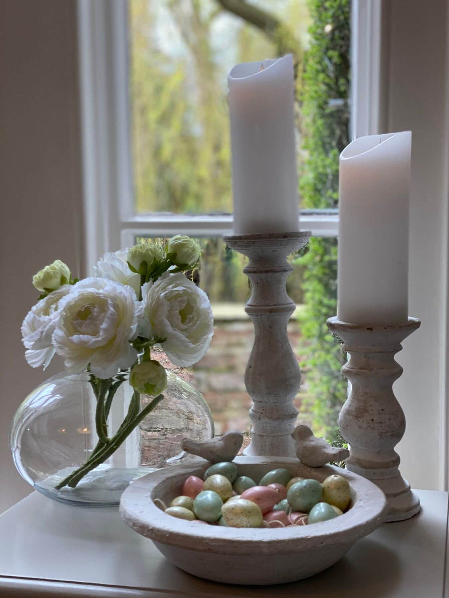 Handcrafted stone-effect bird bath with weathered patina, warm cream finish, and natural textures for garden elegance. by Sostter at brixbailey.com