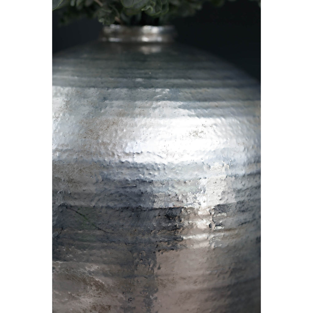 Hand-hammered silver ceramic vase with reflective metallic finish, modern sculptural home decor piece by Sostter at brixbailey.com