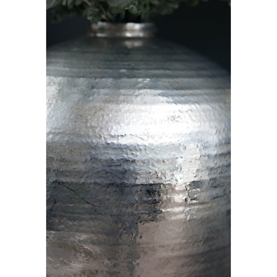 Hand-hammered silver ceramic vase with reflective metallic finish, modern sculptural home decor piece by Sostter at brixbailey.com