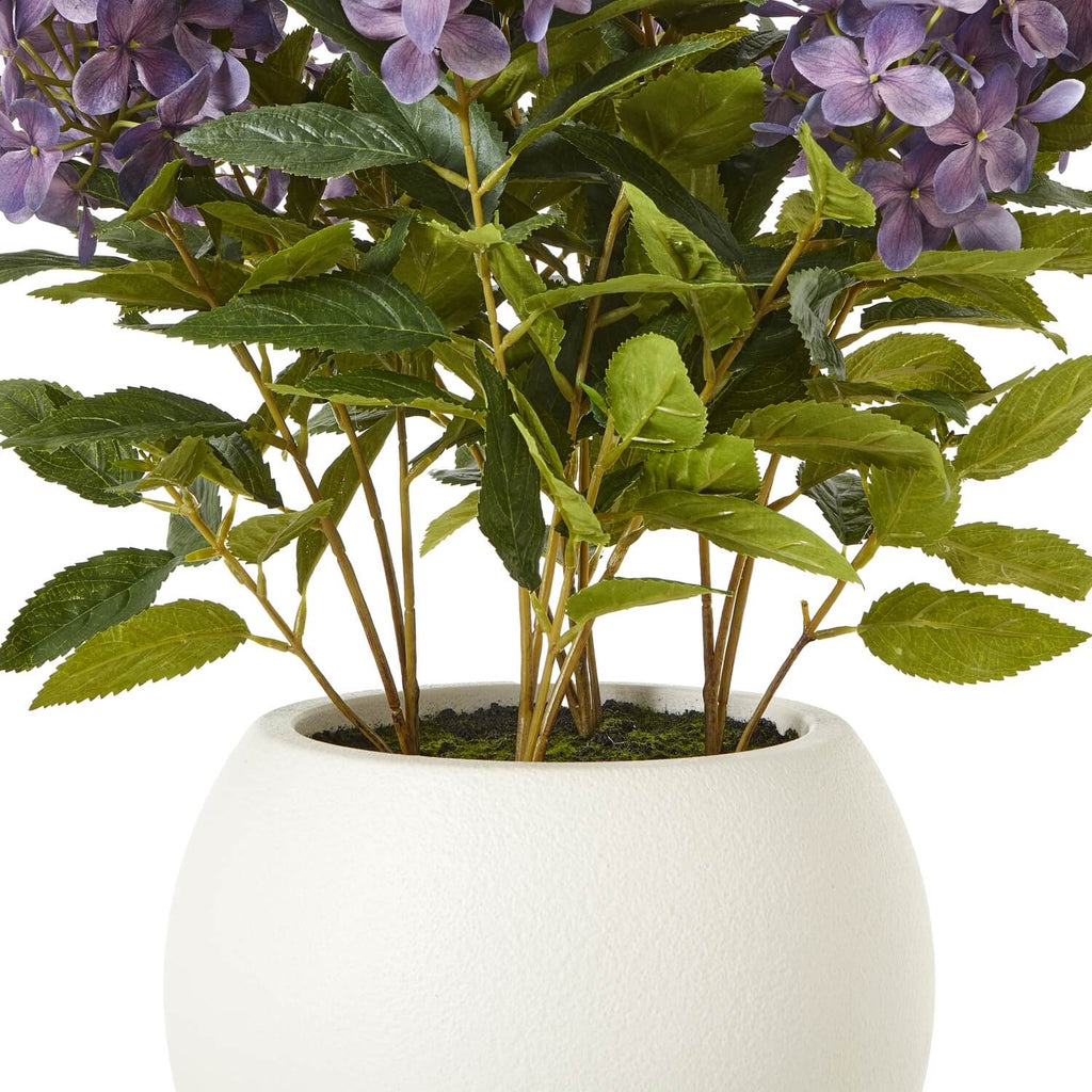 Medium purple faux hydrangea plant in pot, lifelike lavender blooms with green leaves, artificial home decor by Sostter at brixbailey.com