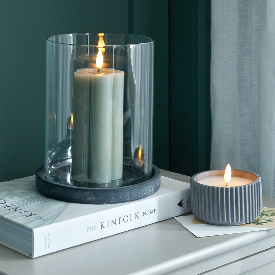 Bringing Refined Charm with a Grey Ceramic Hurricane Lantern - Modern Rustic Design for Indoor & Outdoor Use by Hill Interiors at www.brixbailey.com