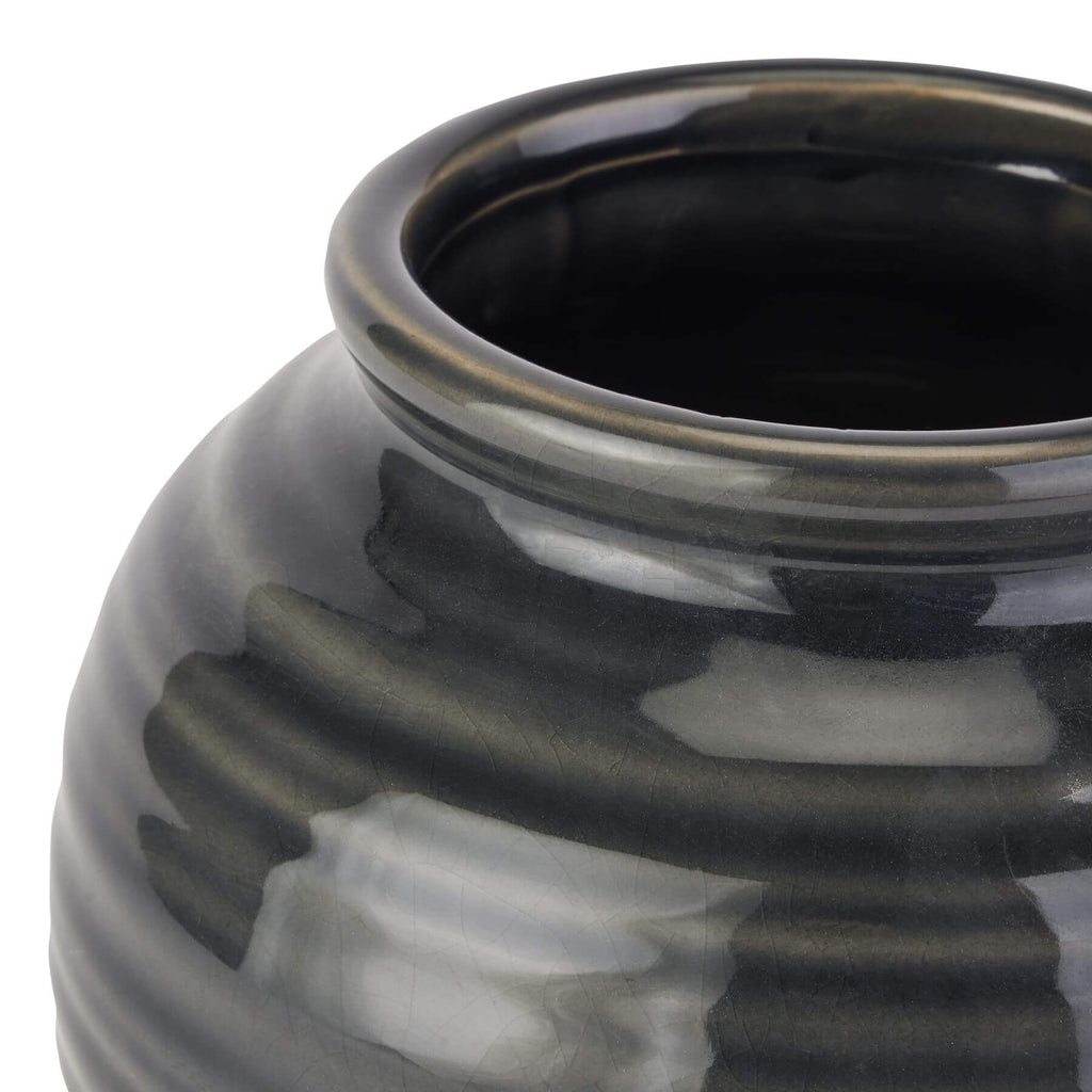 Handcrafted navy ceramic squat vase with rustic glaze, perfect for floral arrangements and modern home decor. by Sostter at brixbailey.com