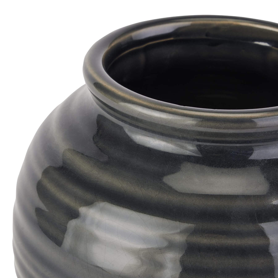 Handcrafted navy ceramic squat vase with rustic glaze, perfect for floral arrangements and modern home decor. by Sostter at brixbailey.com