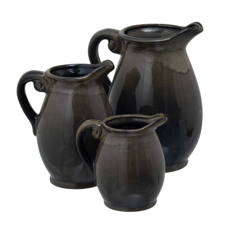 Handcrafted Mediterranean ceramic vase with reactive glaze in organic green and charcoal, unique textured surface. by Sostter at brixbailey.com