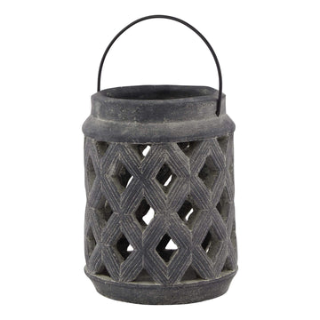 Grey lattice lantern with ceramic base and metal detailing, casting geometric shadow patterns in sophisticated grey finish. by Hill Interiors at brixbailey.com