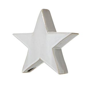 Handcrafted matte white ceramic star ornament with Scandinavian minimalist design for winter holiday decor by sostter at brixbailey.com