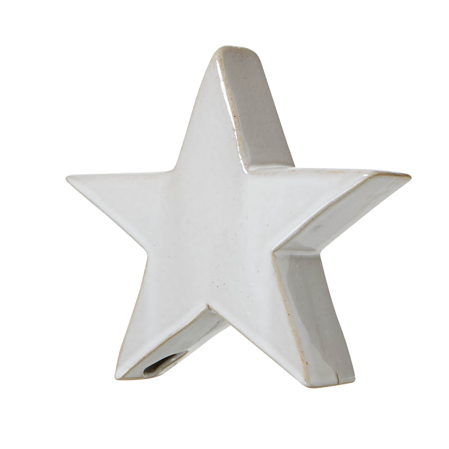 Handcrafted matte white ceramic star ornament with Scandinavian minimalist design for winter holiday decor by Sostter at brixbailey.com