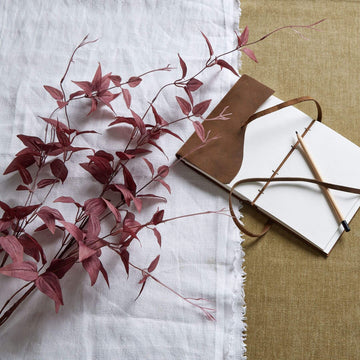 Burgundy plastic botanical stem with wispy tendrils, 88cm tall, for elegant floral arrangements and home decor by Sostter at brixbailey.com