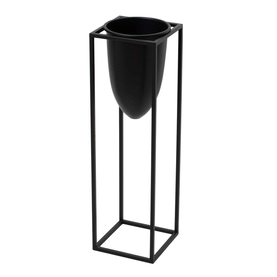 Matte black industrial modern metal planter with sleek bullet design, 62cm tall, for minimalist interiors. by Sostter at brixbailey.com